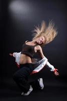 young woman modern dancer in action photo