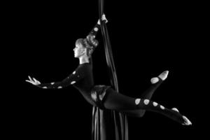 Beautiful dancer on aerial silk, aerial contortion, aerial ribbons