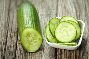 Fresh cucumber on the wooden table