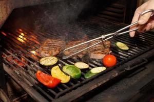 Meat and vegetables on grill