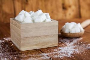 Sugar Cubes in Shaped Bowl with Sugar spill over