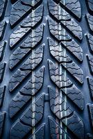 Fragment of new vehicle, car tyre, tire. photo