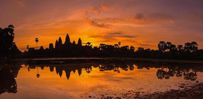 beautiful silhouette of Angkor Wat during sunrise