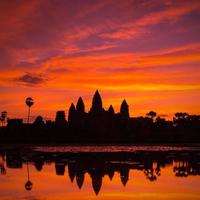 beautiful silhouette of Angkor Wat during sunrise