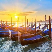 Venetian gondolas at sunrise photo