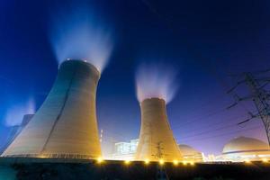 Thermal power plant at night photo