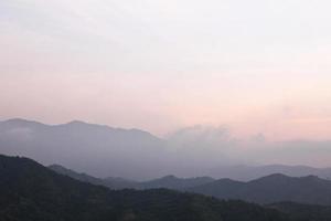 Morning Mist at Tropical Mountain Range, Thailand.