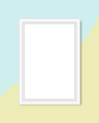 Blank white frame on pastel green and yellow