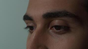 Close up of young man's face concentrating video
