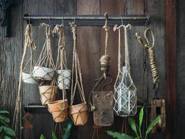 Plant pot decoration displayed on wooden wall Gardening concept photo