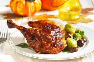 Roasted turkey leg with mash potato, chestnuts and brussels sprouts. photo