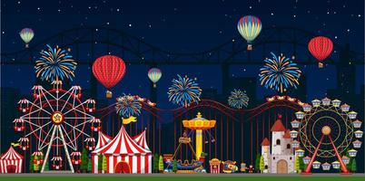 Amusement park scene at night with fireworks vector