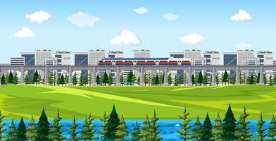 Nature park with a train and cityscape scene vector