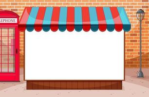 Blank banner with awning in city on brick wall scene vector