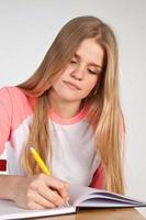 Scandinavian cute young girl writting