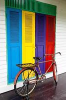 Bicycles on color door background