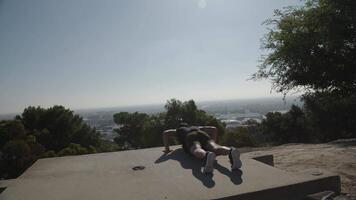 Slow motion of mid adult man doing burpees video