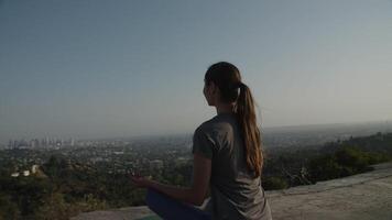 Slow motion of woman meditating video