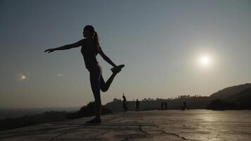 Slow motion of woman doing yoga pose video