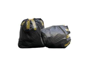 Two black garbage bags photo