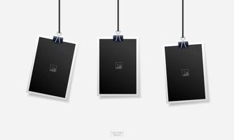 Hanging angled empty photo frames on white vector