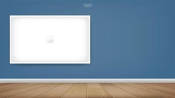 Empty photo frame on blue wall in room space vector