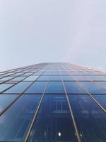 Low angle of glass building photo