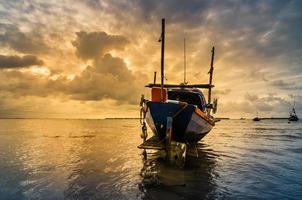 Fishing sea boat and Sunrise photo
