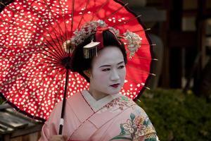 japanese geisha girl in pink photo