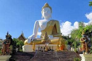 Sitting Buddha statue in Northern Thailand photo