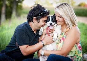 Young couple with dogs photo