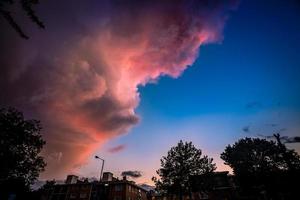 Dramatic purple sky over town photo
