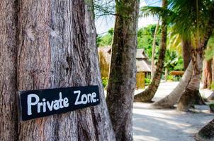 Private zone sign standing for restricted access photo