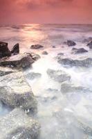 Waves and rocks long exposure. photo