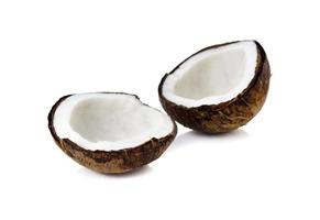 mature coconut for oil preparing and coconut milk on white