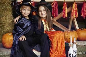 Siblings celebrating great Halloween party photo