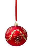 Hanging red christmas ball isolated photo