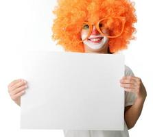 Cute funny clown child on white background photo