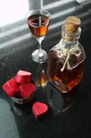 Glass and liqueur bottle photo