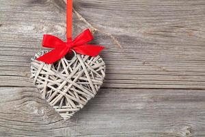 Heart over wooden background