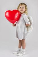 Angel with red heart photo