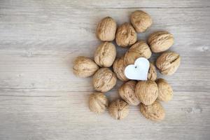 Heart nutcracker on walnuts