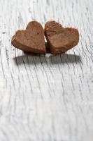 Hearts on Wooden Background photo