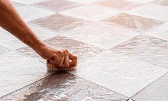 Cleaning the tile floor photo