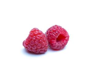 Raspberries on white background photo