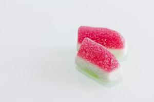 Red and white gummy watermelons photo