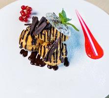Dessert with chocolate and red glaze photo
