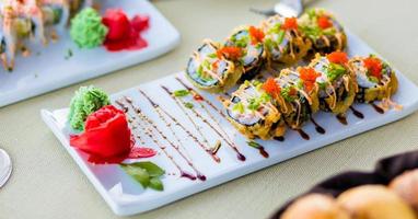 Colorful sushi rolls with salmon photo