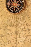 Old compass and map photo