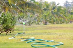 Water sprinkler in garden. photo